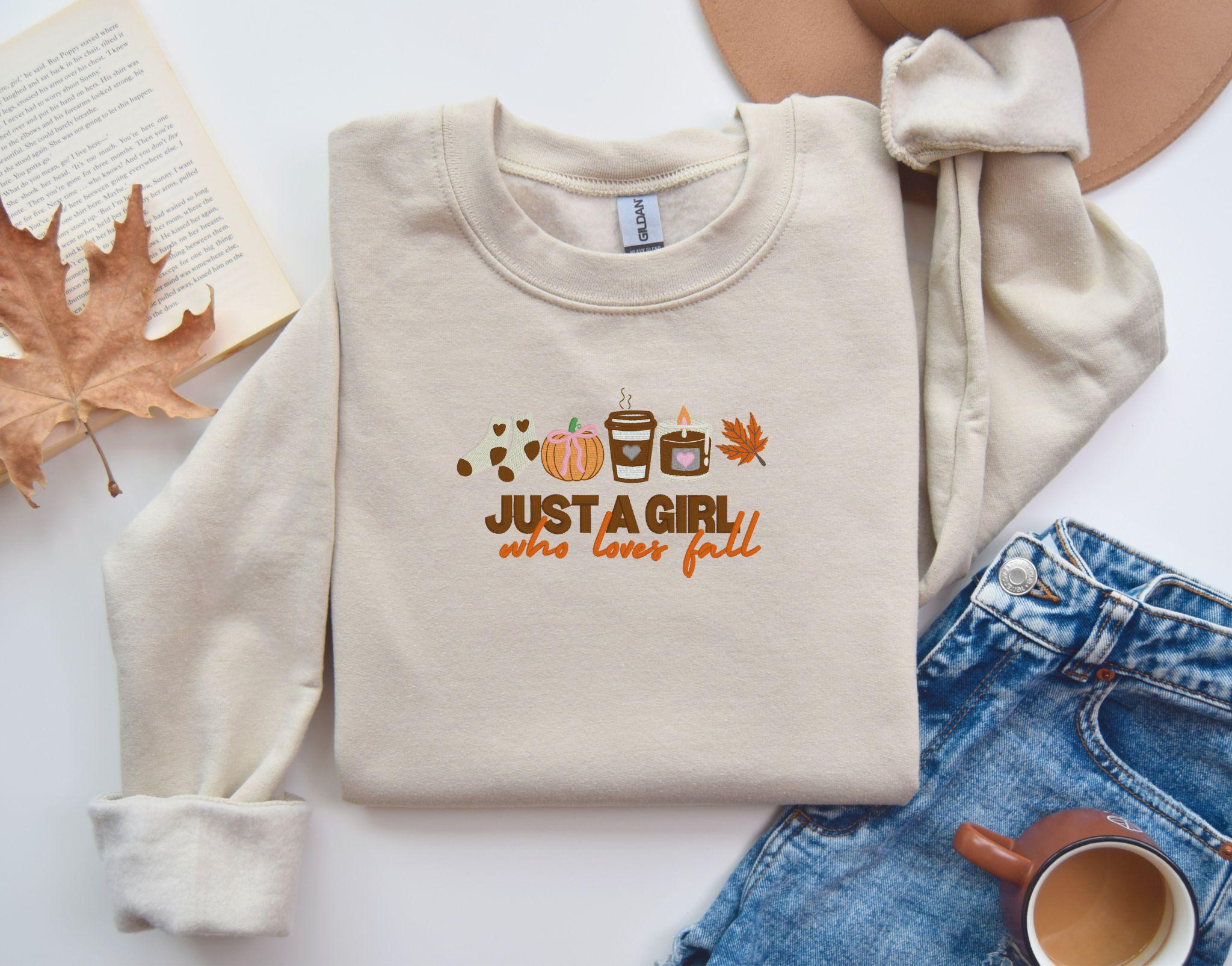 Just a girl who loves fall Embroidered Sweatshirt gildan 18000