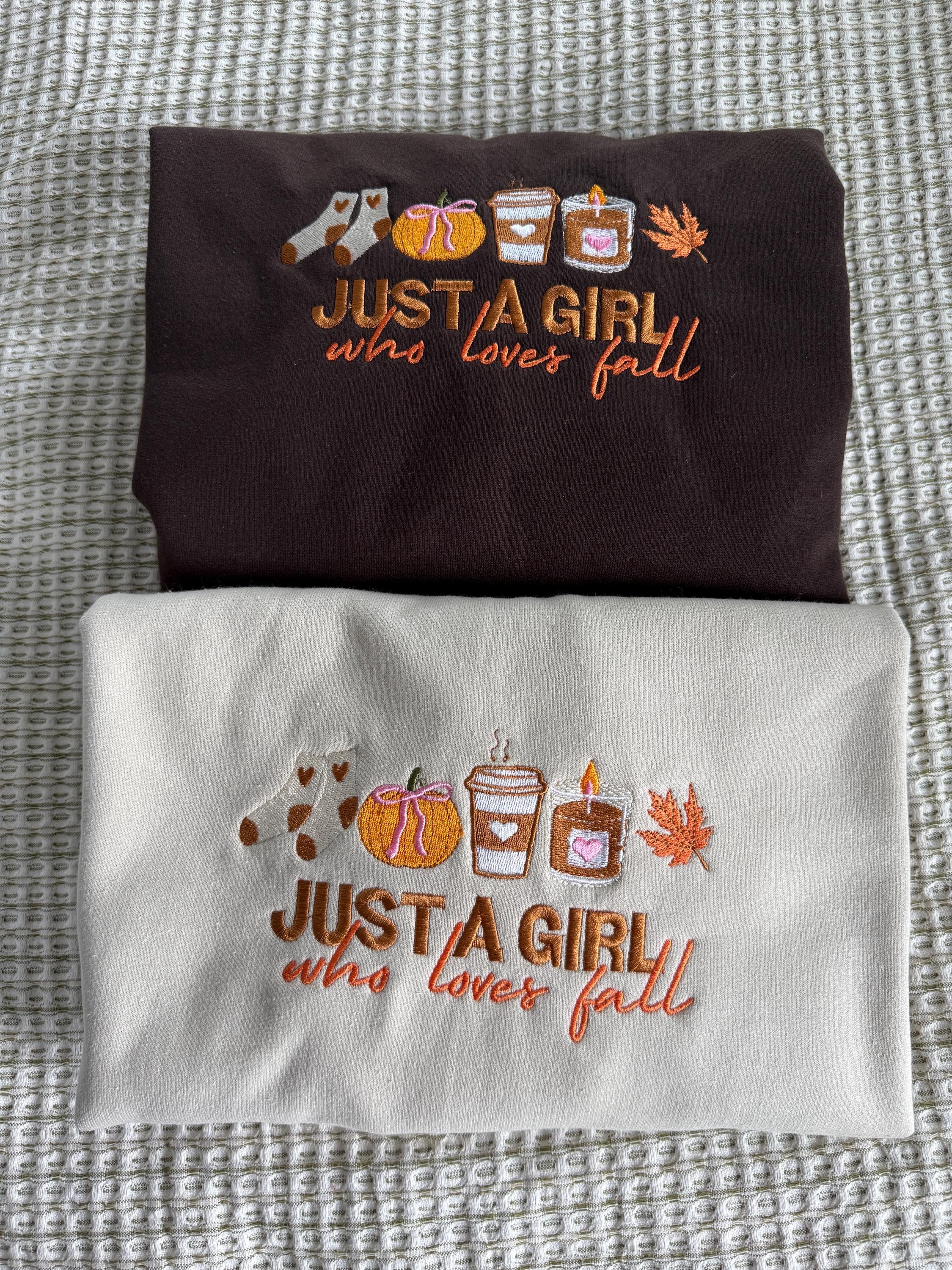 Just a girl who loves fall Embroidered Sweatshirt gildan 18000